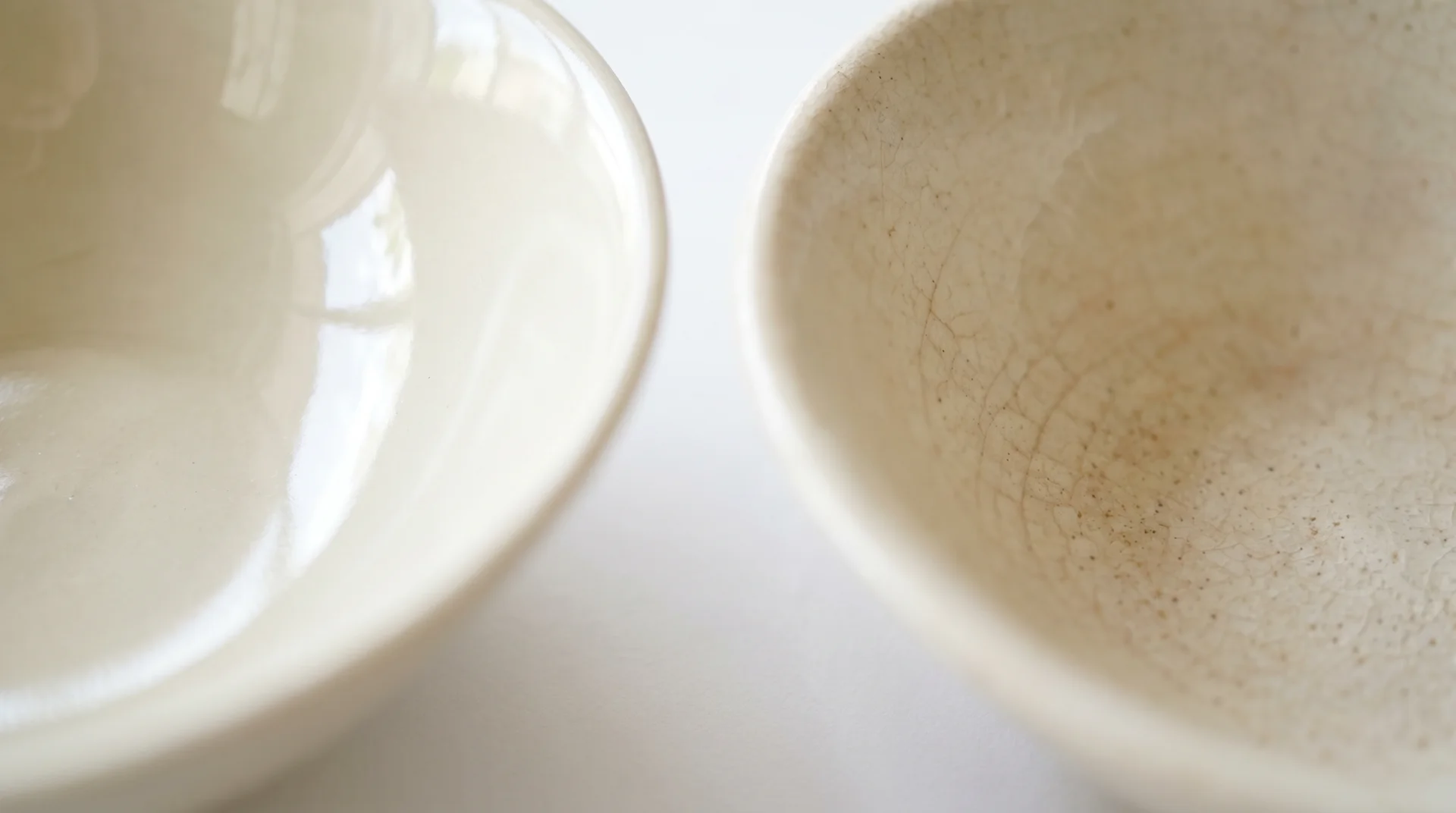 Close-up comparison of intact ceramic glaze versus crazed and cracked glaze surface
