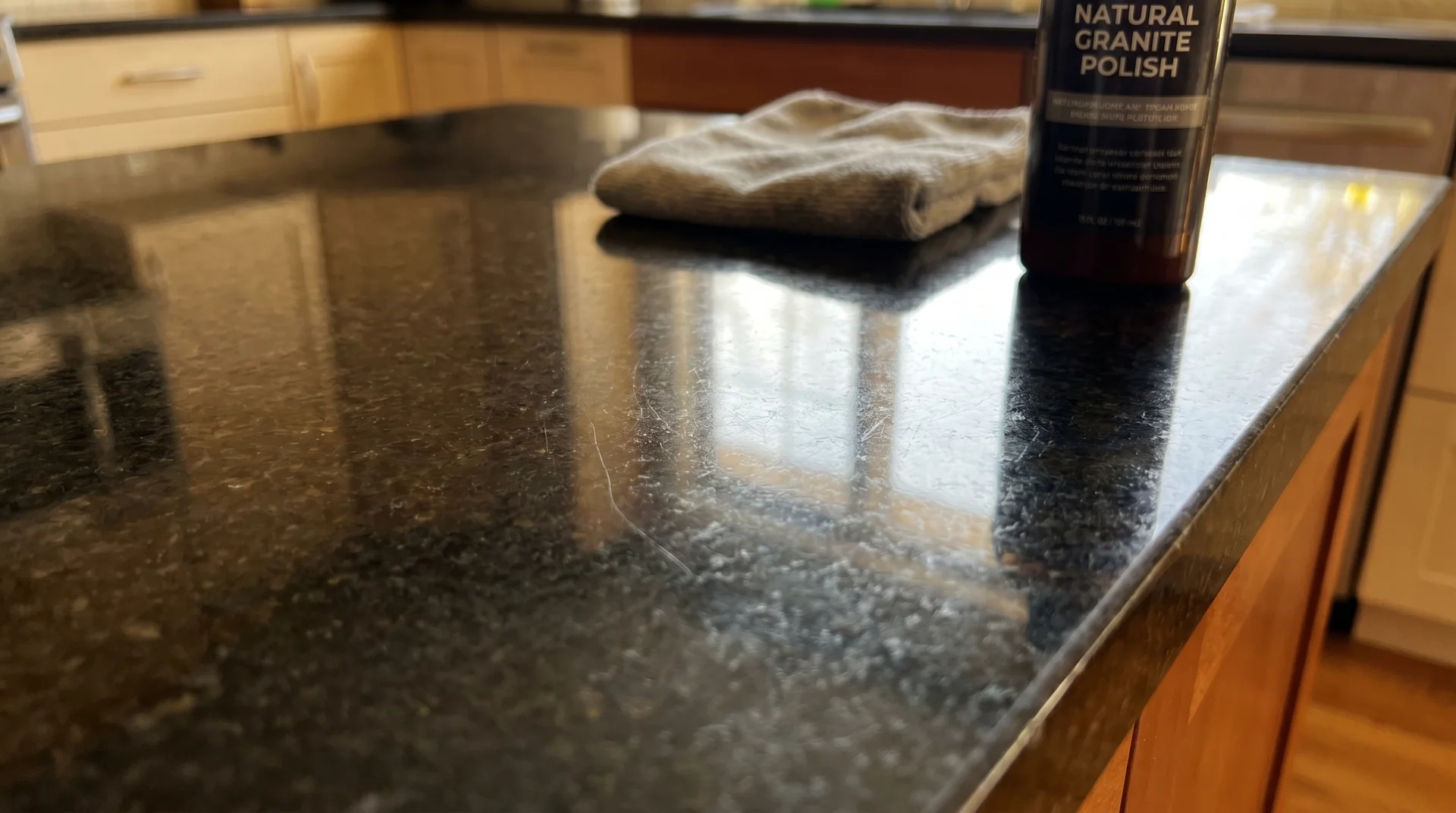 Light surface scratches visible on polished granite countertop