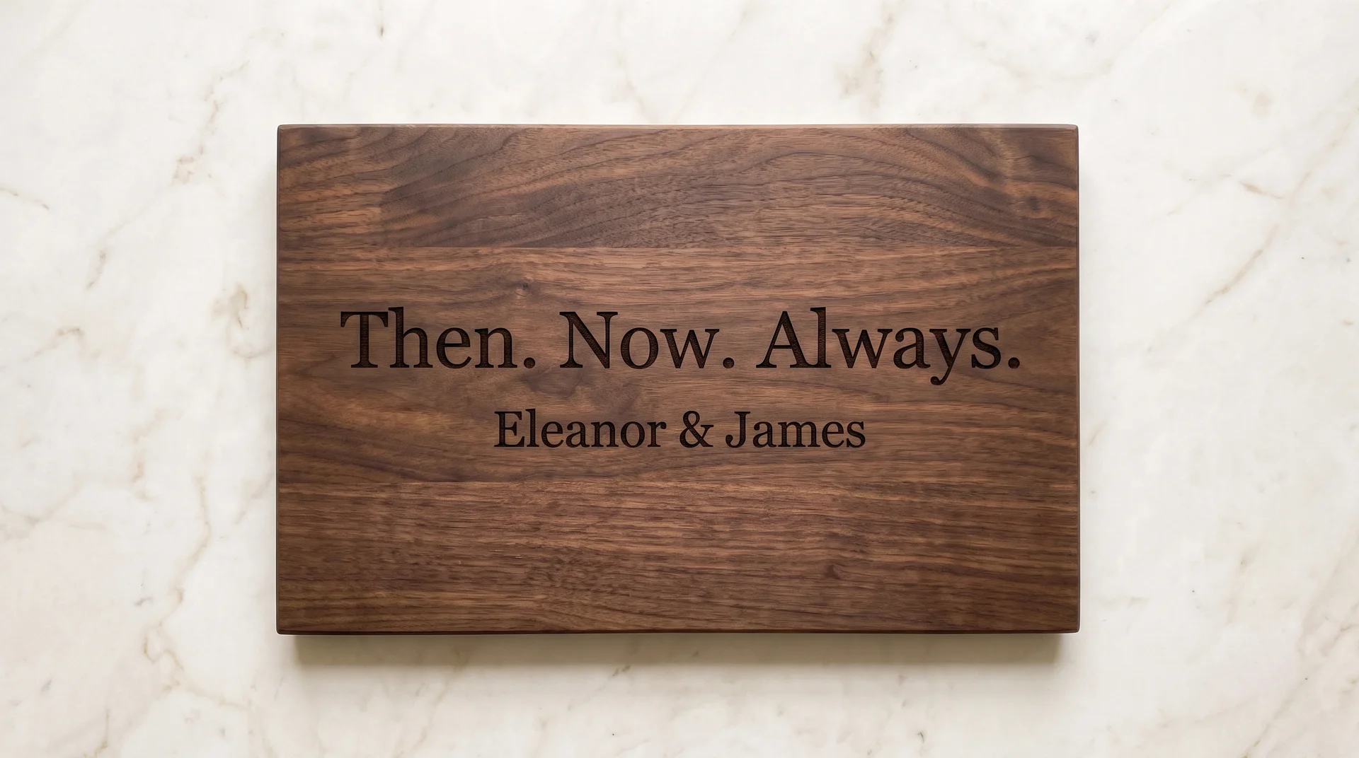 Walnut board with 'Then. Now. Always.' in classical serif above two names in smaller type, cream marble